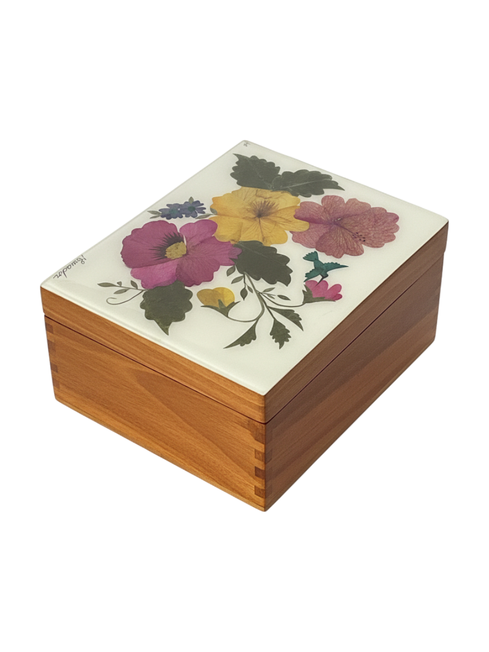 Caja de té con petalos de flores secas